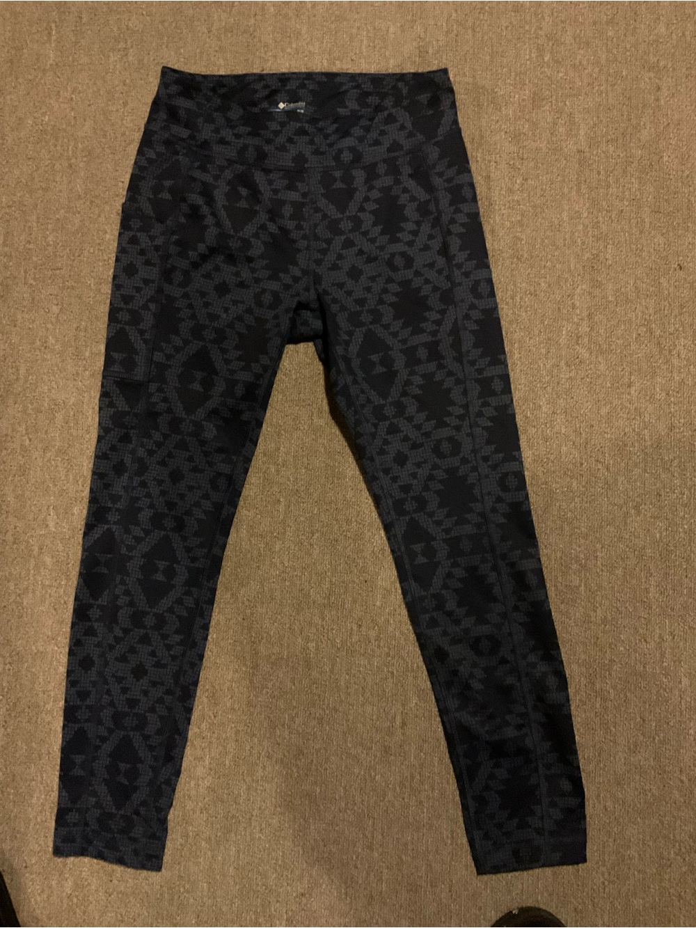 Columbia navy blue Geometric-Print Leggings with side pockets.